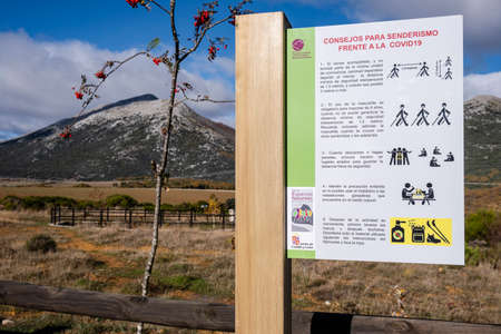 poster with rules for COVID-19 for walkers, Tejeda de Tosande. Fuentes Carrionas Natural Park, Fuente Cobre- Palentina Mountain. Palencia, Spainのeditorial素材