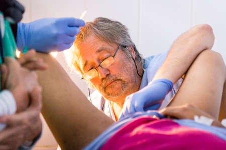 postpartum vulvar hematoma debridement, health center, Lancetillo (La Parroquia), UspantÃ¡n municipality, Quiche, Sierra de ChamÃ¡, Guatemala, Central Americaのeditorial素材
