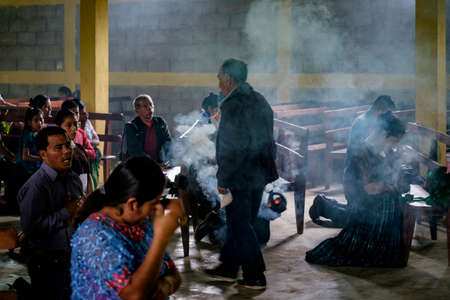 Mass in the Catholic church, La TaÃ±a, Franja Transversal del Norte, QuichÃ© department, Guatemalaのeditorial素材