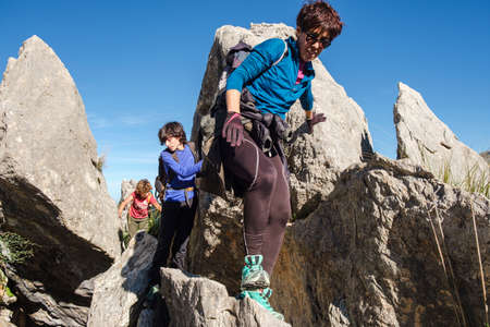 hikers ascending to Puig de Ses Vinyes by the northeast ridge, Escorca, Mallorca, Balearic Islands, Spainのeditorial素材