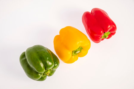 green, yellow and red pepper, Capsicumの写真素材
