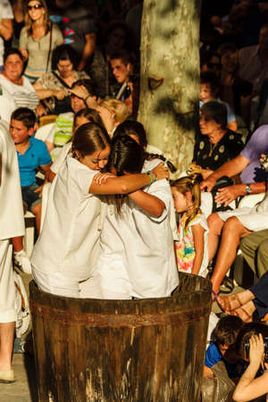 grape stomping contest, Es Vermar festival, Binissalem, Mallorca, Balearic Islands, Spain, Europeのeditorial素材