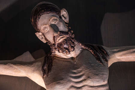 Christ on the cross, 12th century, carved walnut wood, comes from San Vicente de Ardisa, Diocesan Museum of Jaca, Huesca, Spainのeditorial素材