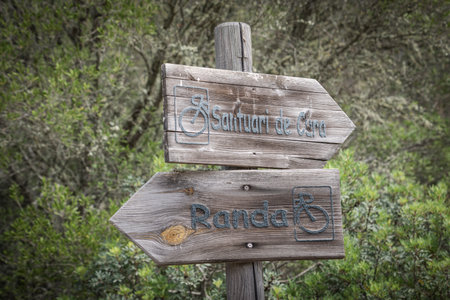 local wooden sign indicating a cycling route, Randa, Majorca, Balearic Islands, Spainの写真素材