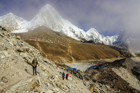ascent to the Kala Patthar 5550mts and summit of the Pumori 7165 mts.glacier of Khumbu.Sagarmatha National Park, Khumbu Himal, Nepal, Asia.の写真素材