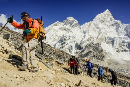 group of mountaineers ascending the Kala Patthar.Nuptse 7864 mts and mount Everest 8848 mts.Khumbu...