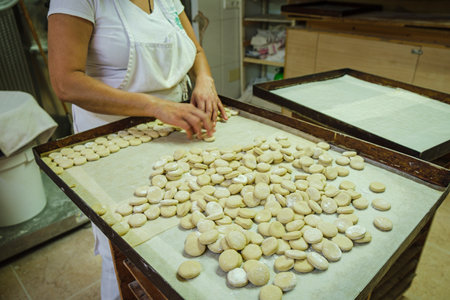 kneading organic oil cookies, Sa Teulera farm, Petra, Majorca, Balearic Islands, Spainの写真素材