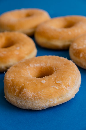 donuts on blue backgroundの写真素材