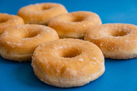 donuts on blue backgroundの写真素材