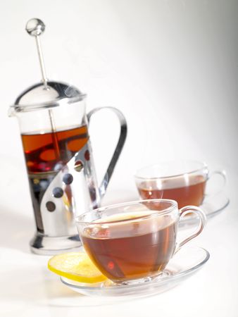 french-press with pair cups of tea and trickle steamの写真素材