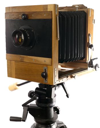Vintage large format photo camera on tripod. Isolated on whiteの写真素材