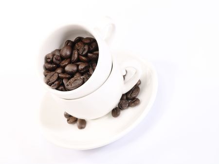 Two cup of coffee on the plate with beans. Is not isolated imageの写真素材