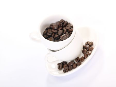 Two cup of coffee on the plate with beans. Is not isolated imageの写真素材