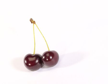fresh ripe cherry with drop shadow. is not isolatedの写真素材