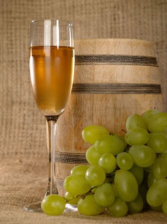Old wine still-life with grape and wine bowlの写真素材
