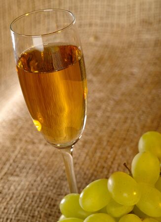 Old wine still-life with grape and wine bowlの写真素材