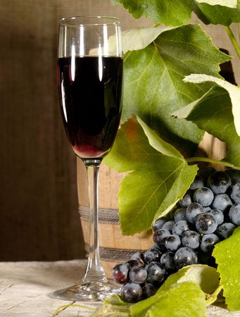 Old red wine with grape still-lifeの写真素材