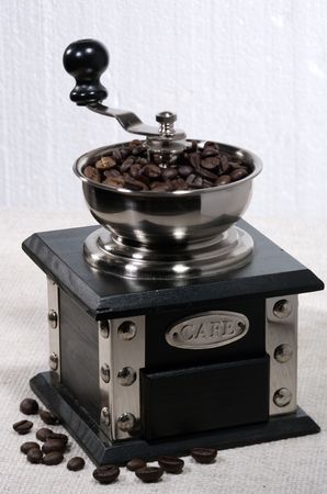 Coffee grinder with beans, cuisine still lifeの写真素材