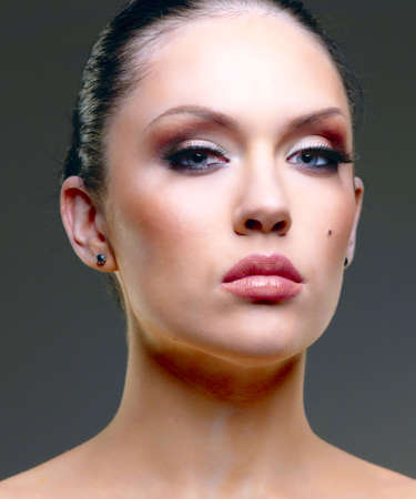 Pretty young woman stylish studio portraitの写真素材