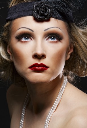 Woman's retro revival portrait. 30's of the XX century. Professional makeupの写真素材