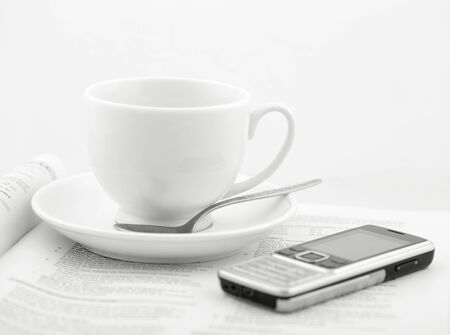 business lunch. coffee cup and handy over issueの写真素材