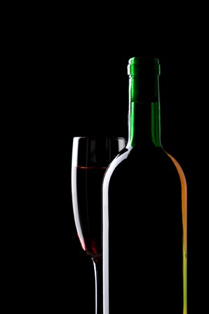 wine still life over deep black backgroundの写真素材