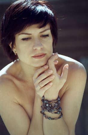 beauty adult brunette portrait. scanned film source, film grain saved as art elementの写真素材
