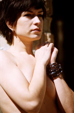 beauty adult brunette portrait. scanned film source, film grain saved as art elementの写真素材
