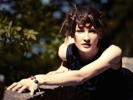 pretty young woman portrait. outdoor shot, polaroid film stylizationの写真素材
