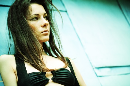 dramatic female portrait. cross-process imitation film grain added for art effectの写真素材