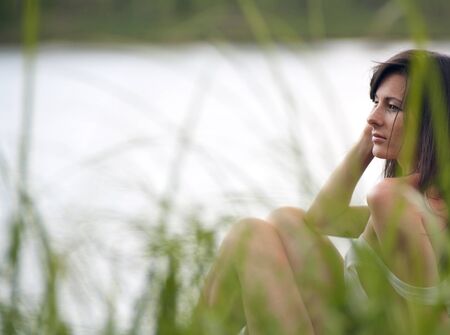 on the lake. rural female portraitの写真素材
