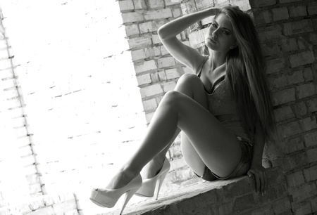 pretty blond girl urban portraitの写真素材