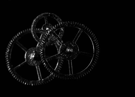 old cogwheel over black backgroundsの写真素材
