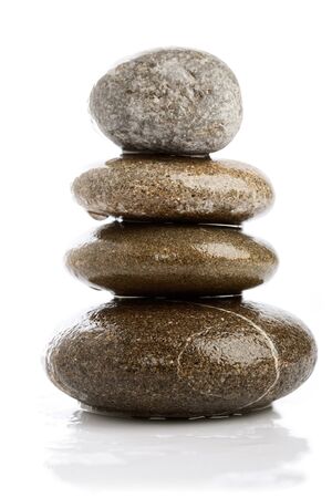 wet pebbles over white backgroundsの写真素材