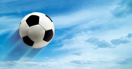 abstract football ar soccer backgrounds against blue skiesの写真素材
