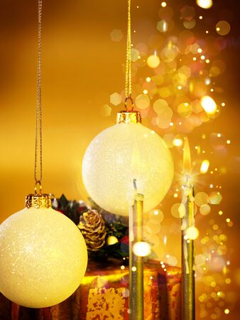 Xmas still-life with candles and christmas ballsの写真素材