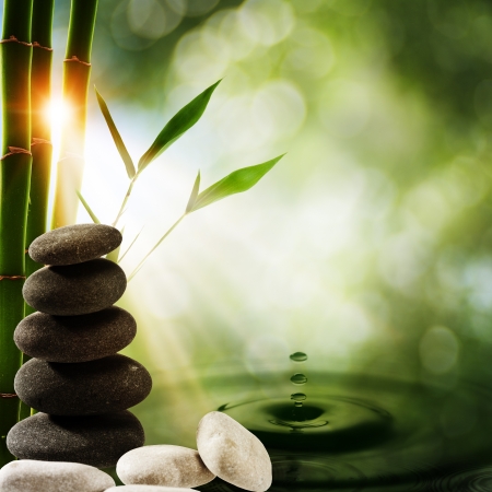 Oriental eco backgrounds with bamboo and water splashの写真素材