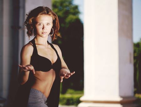 Pretty dancer. Retro styled female urban portraitの写真素材