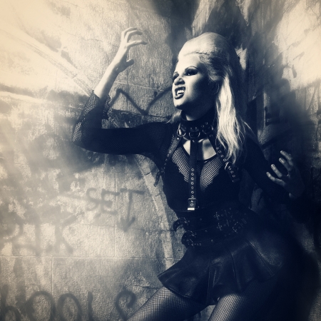 To Burn In Hell. Grungy female portraitの写真素材