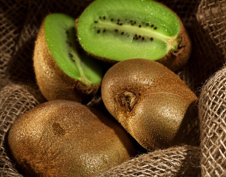 kiwi fruit on the burlap textile still lifeの写真素材