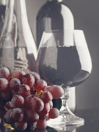 Retro still life with grape and wine for your designの写真素材