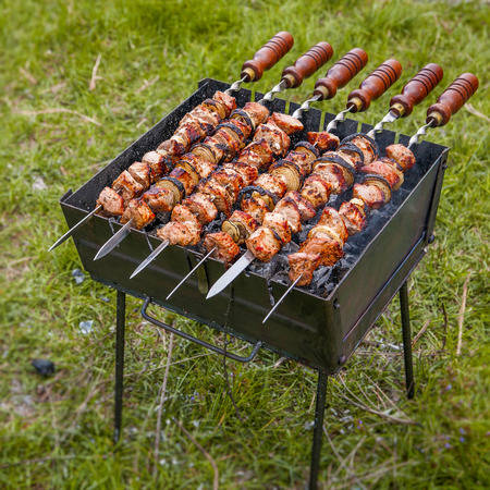 Easy lunch in the hiking, grilled meat on the brazierの写真素材