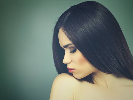 Fashionable female portrait. Vogue style brunette girl.の写真素材