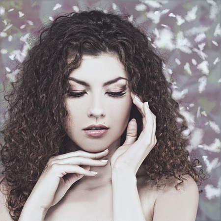 Fashionable female portrait over abstract backgrounds. Vogue style brunette girl.の写真素材