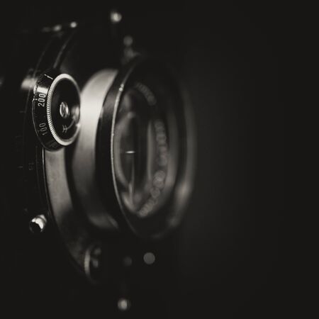 Retro view camera lens with vintage shutter, abstract techno backgrounds. Grungy textureの写真素材