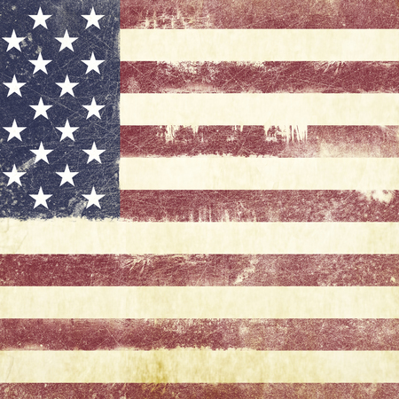 Grungy american flag, abstract patriotic background with scratchesの写真素材