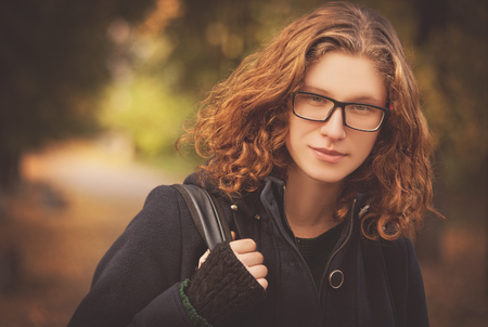 Beauty female student musician portraitの写真素材