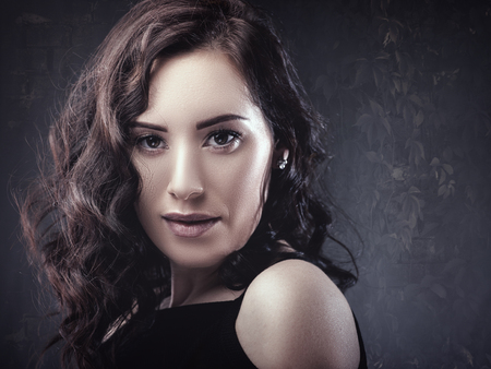 Beautiful brunette. Middle aged woman portraitの写真素材