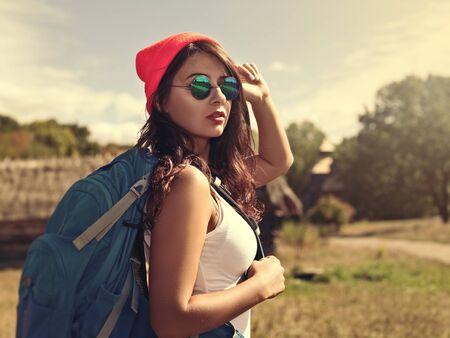 Young beauty hiker walking outdoors, female lifestyle portraitの写真素材
