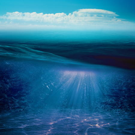 Abstract marine backgrounds with sun beam and underwater landscapeの写真素材
